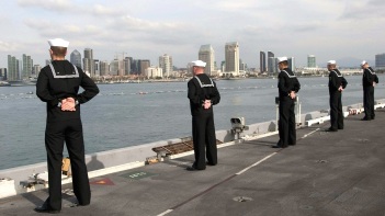 Sailors standing at Parade Rest.